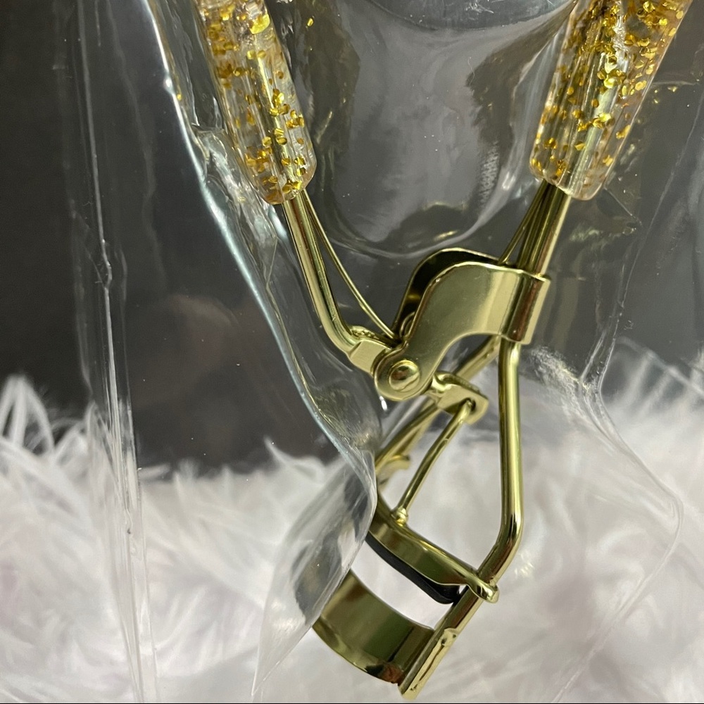 Paris Hilton glitter eyelash curler